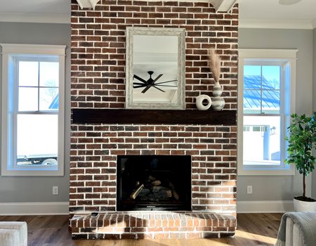Brick_Fireplace_in_a_Reeves_Homes.JPG